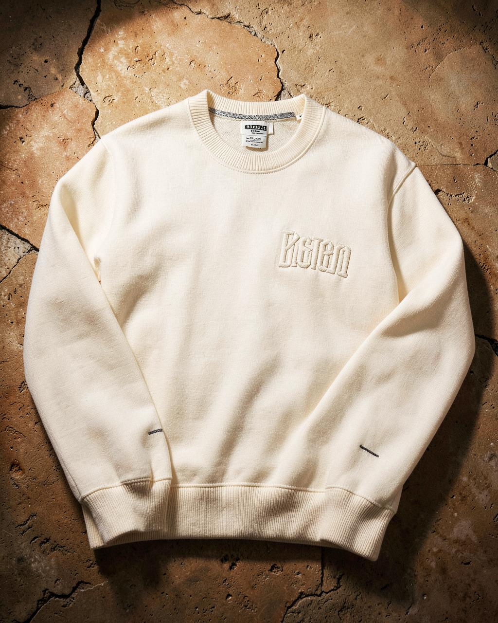 Ivory crewneck sweatshirt with a tonal embroidered chest wordmark